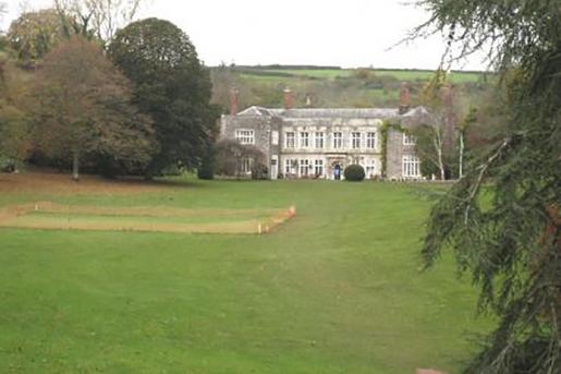 Cockington Court set in ornamental parkland